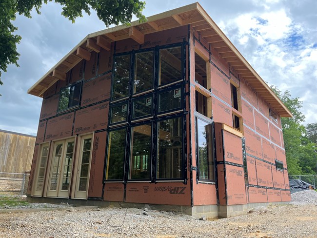 A large building in a construction site.