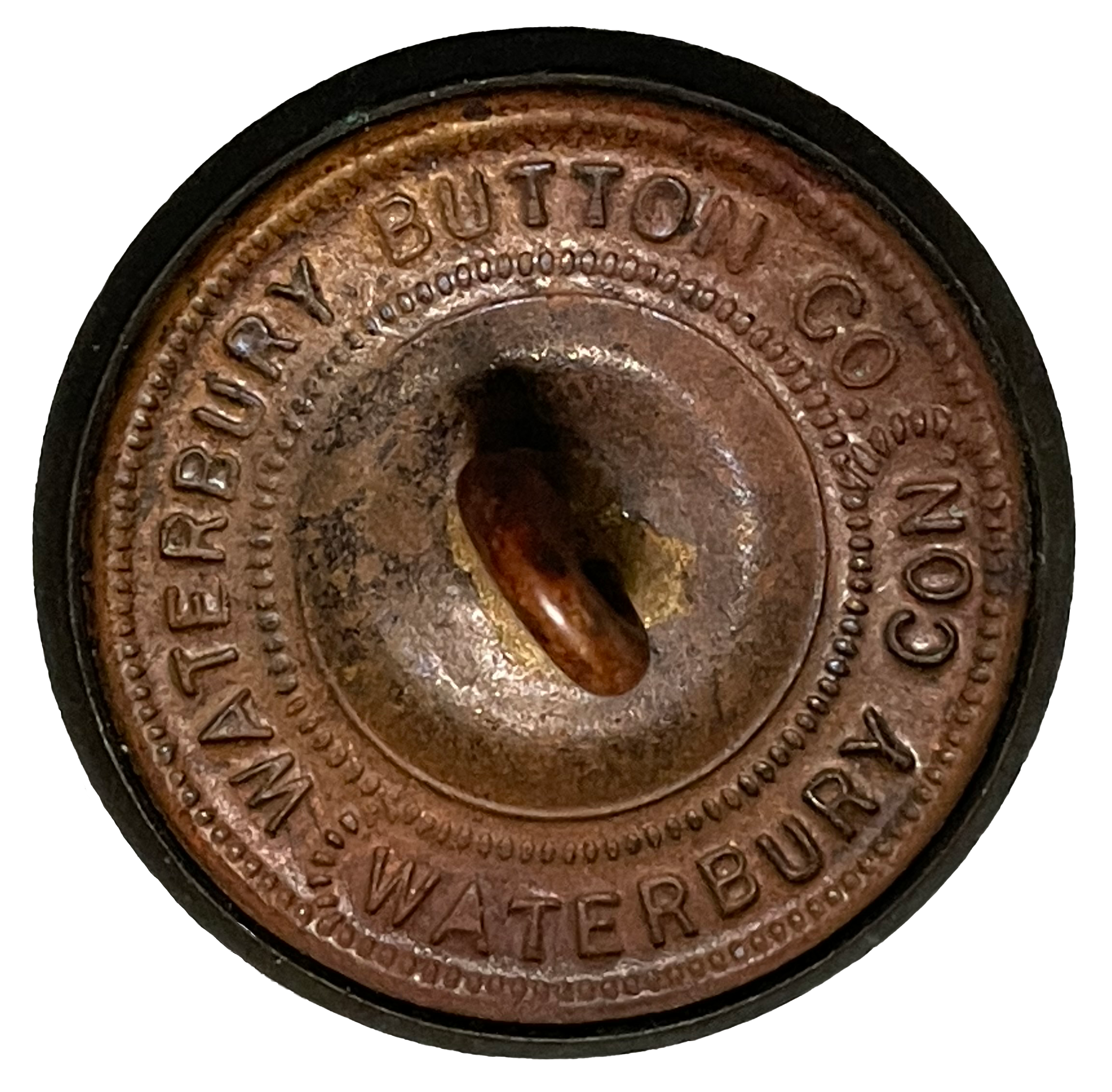 Back of a button marked Waterbury Button Co. Waterbury Con.