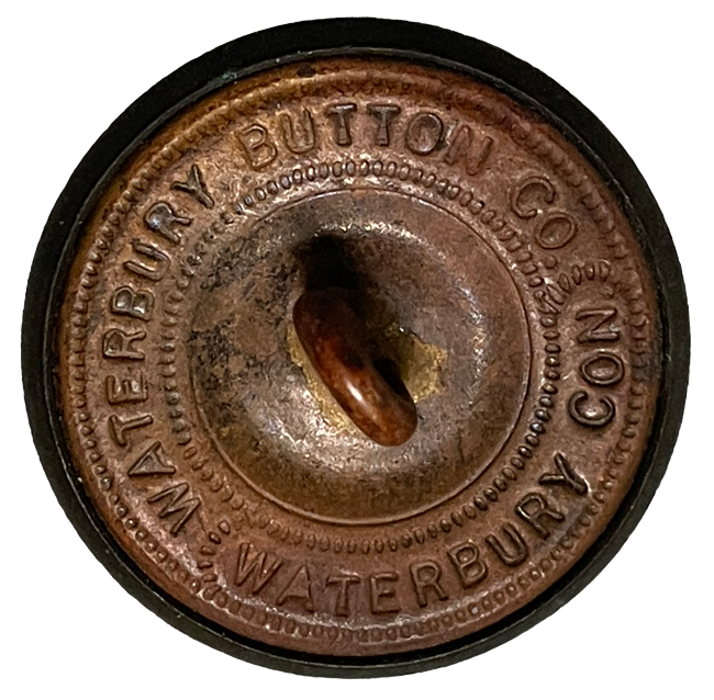Back of a button marked Waterbury Button Co. Waterbury Con.
