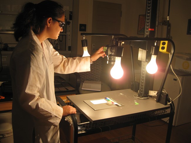 Caitlin Oshida is taking photos of preliminary testing samples.