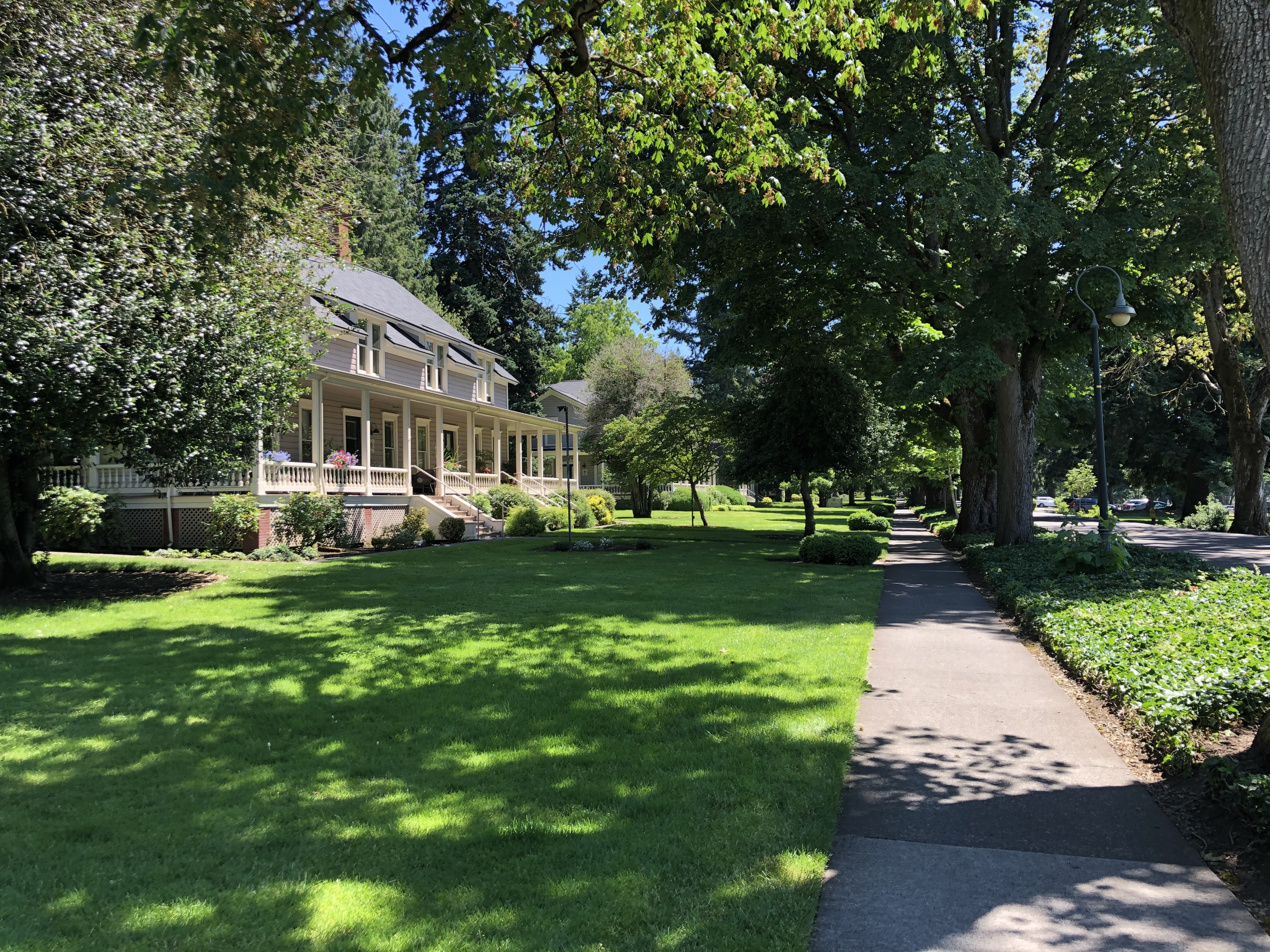 A photo of Officers' Row in Vancouver Barracks on a sunny day.