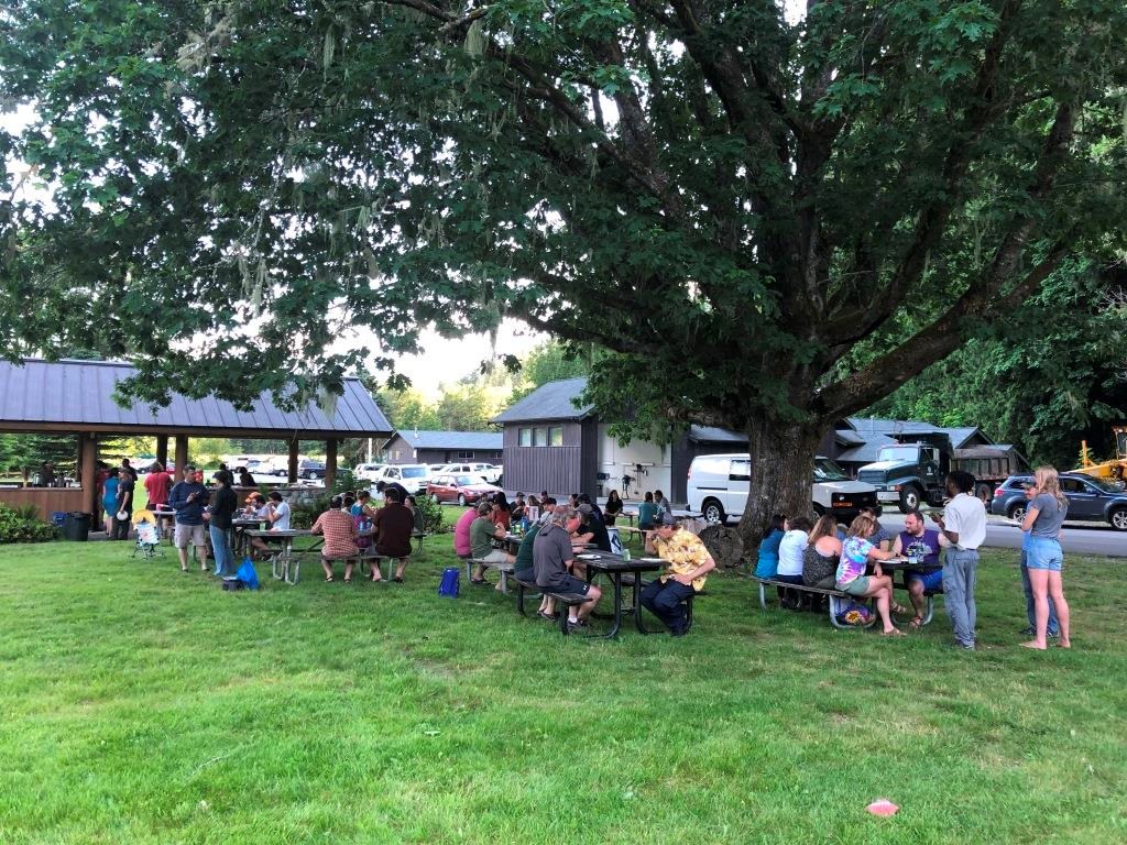NPS staff gather under a mature Northern red oak.