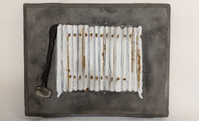 Cast iron piece depicting a radiator
