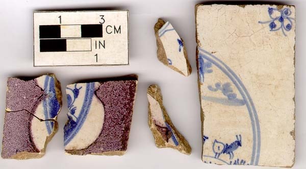 Blue and white decorated tile fragments