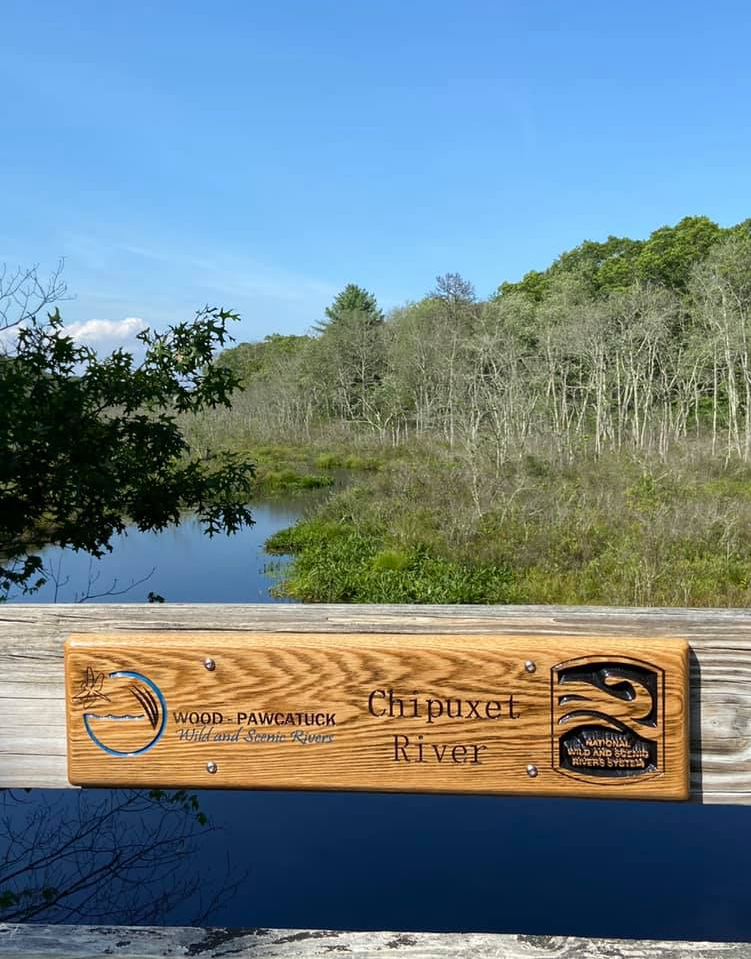 River crossing sign installed along a bike path over the Chipuxet River, South Kingstown, RI to instill pride in the achievement of Wild and Scenic designation. Photo by Bill McCusker.