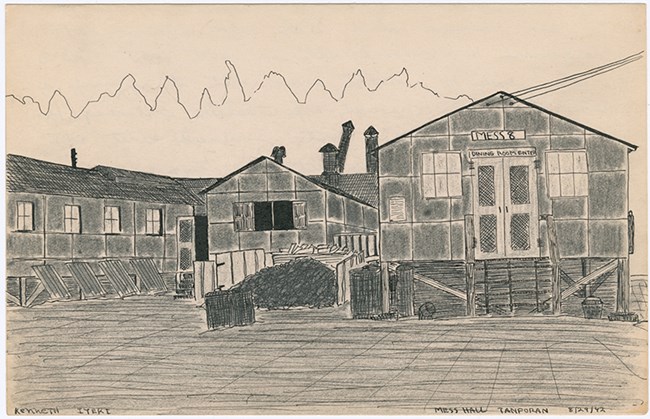 Black and white drawing of long barracks-like buildings with tar paper, tilting chimneys, and wires.
