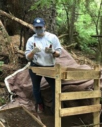 Kaitlyn Boutin posing with two thumbs up.