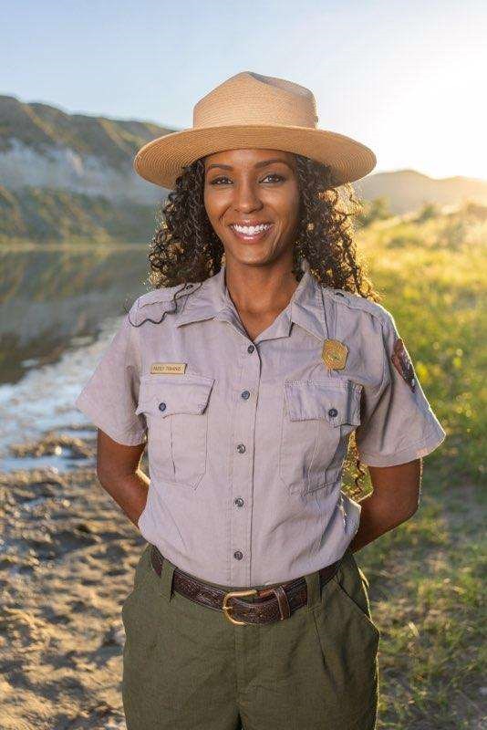 black woman in a park ranger uniform