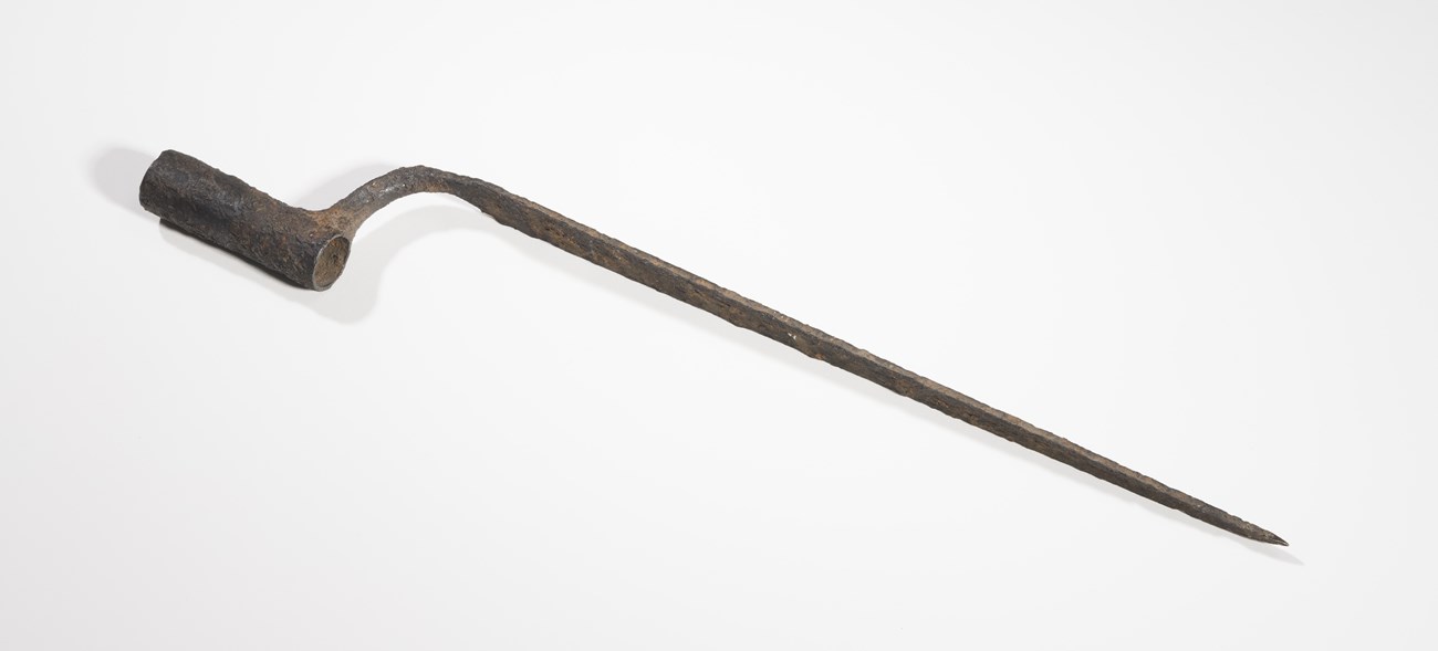 Bayonet with pitted surface