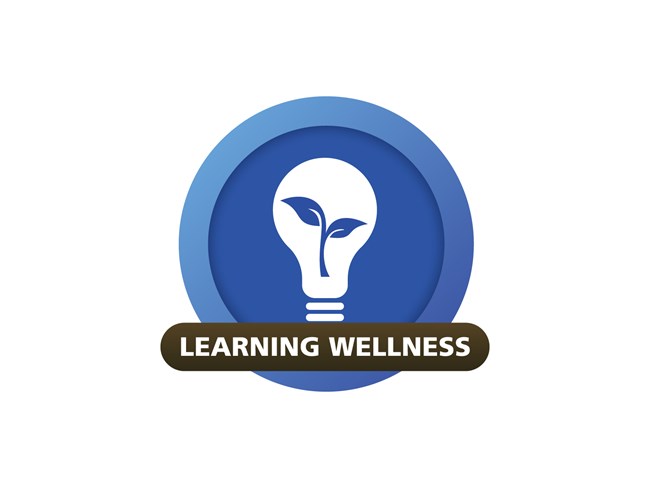 Learning Wellness badge, lightbulb with a growing plant inside