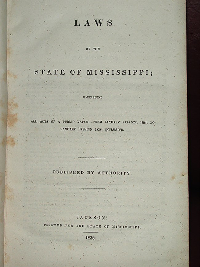 A front page of an old book with the text: Laws of the State of Mississippi, 1838