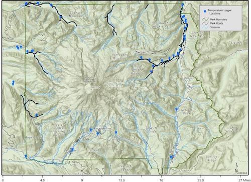 A map of Mount Rainier National Park with streams on the north and west side of the park outlined in black with blue markers along the streams indicating the locations of temperature loggers.