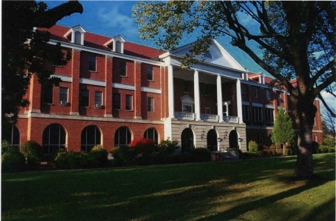 Photograph of the front of the main building in the Roseburg Veterans Association Hospital Complex.