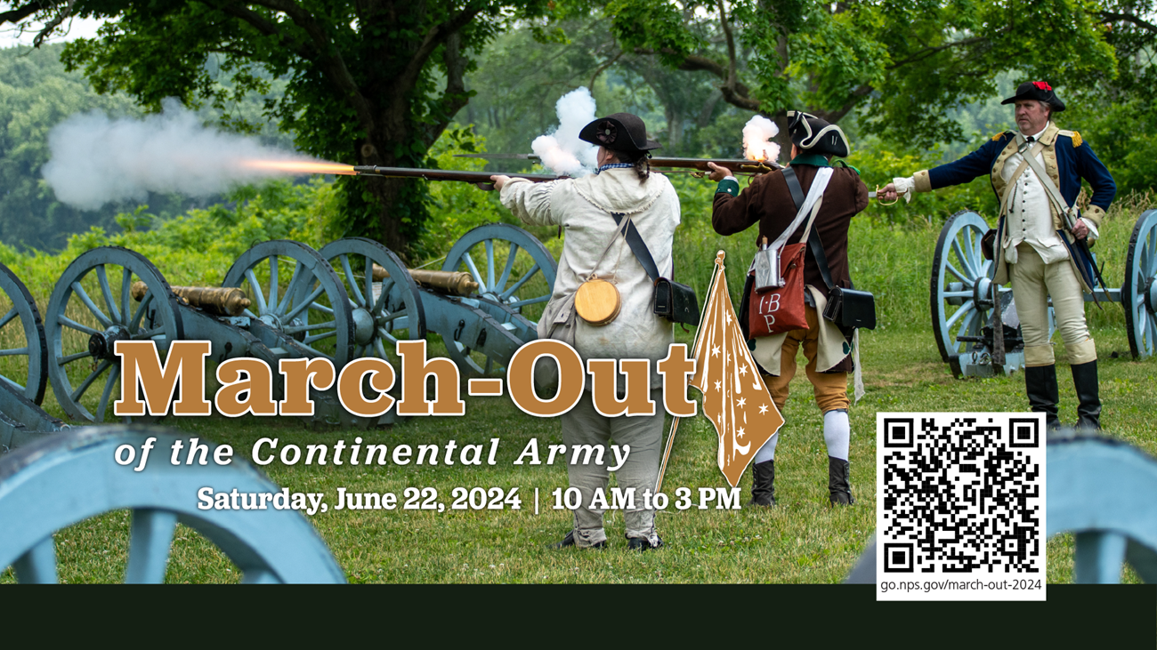 two soldiers wearing revolutionary war uniforms fire muskets. smoke and fire come out the ends of the guns.