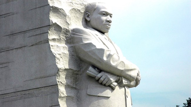 Image of a man carved out of stone