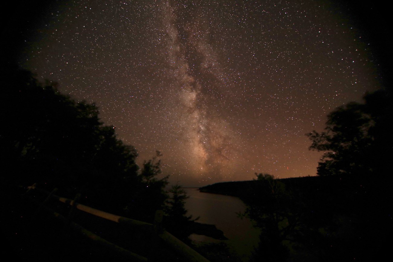 The Milky Way extends over Otter Cove.