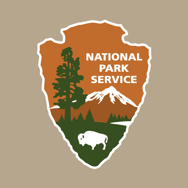 NPS arrowhead with beige background