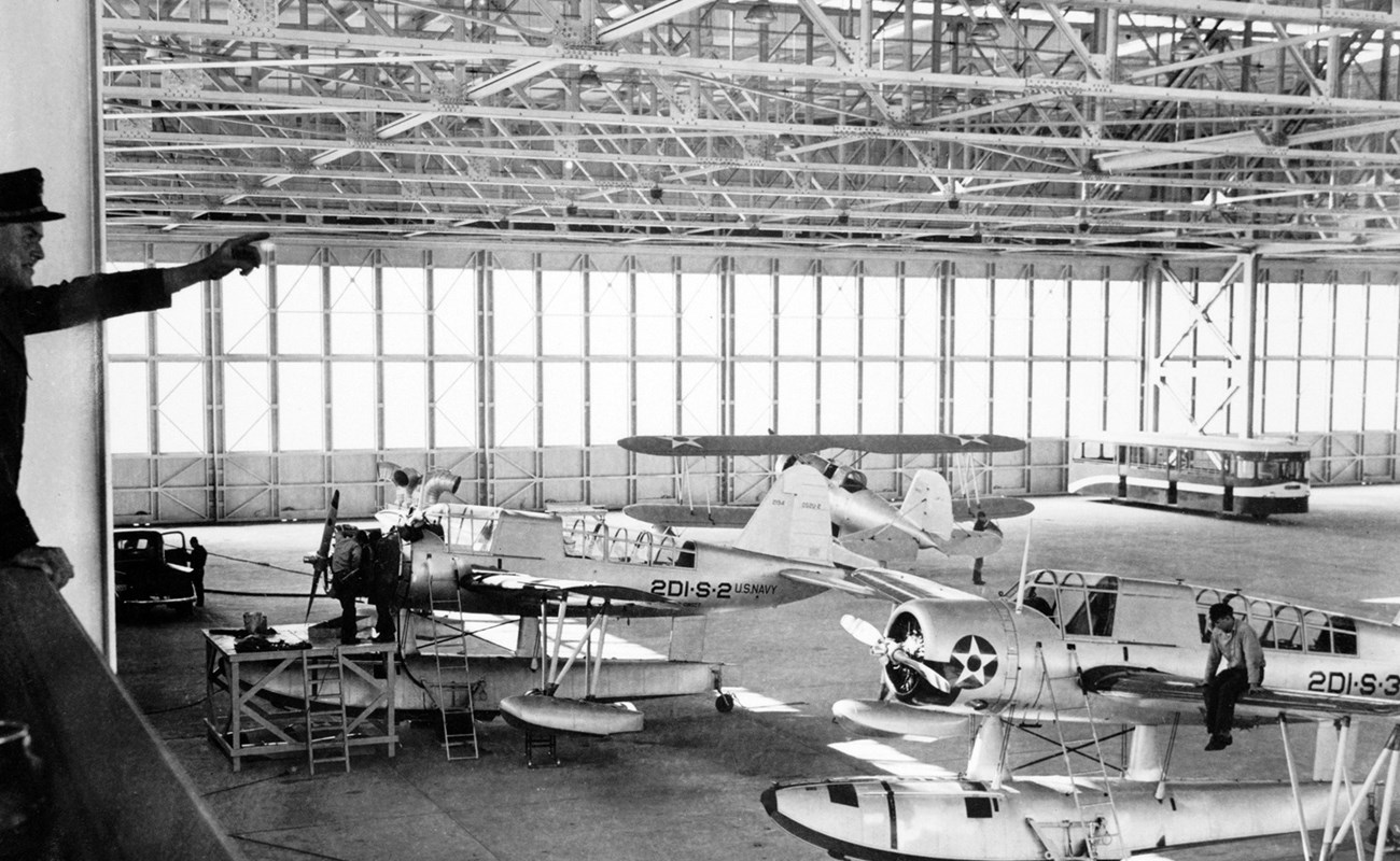 seaplanes lined up in hanger