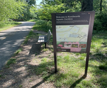 Image of an NPS Entrance Sign that says "Welcome to Kenilworth Aquatic Gardens" with a wayfindig map located at the NPS Kenilworth Park and Aquatic Gardens site.