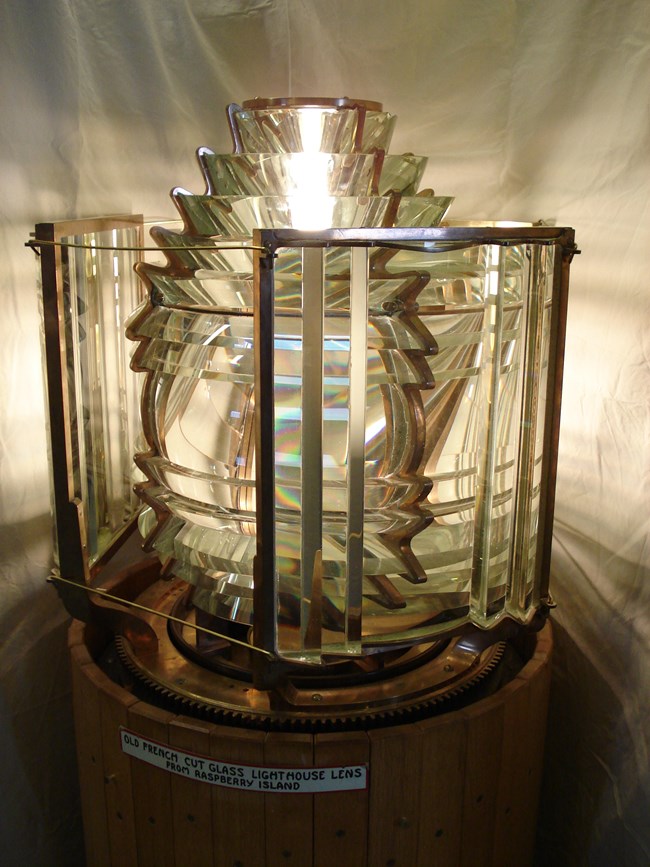 5th order glass Fresnel Lens lit up.