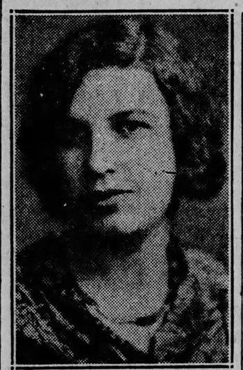 Close up image of a woman with chin length hair. She faces the camera with a slight smile on her face.