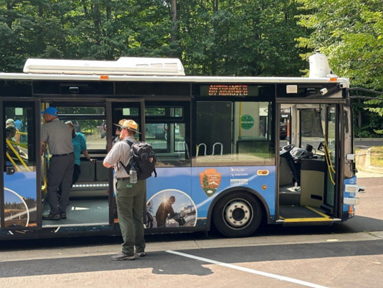 Automated electric bus parked in parking lot at Sleeping Bear Dunes National Lakeshore