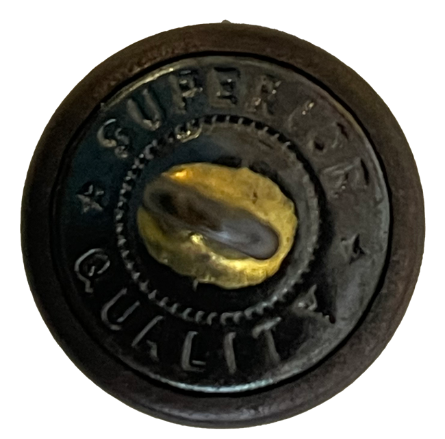 Back view of button marked "Superior Quality"