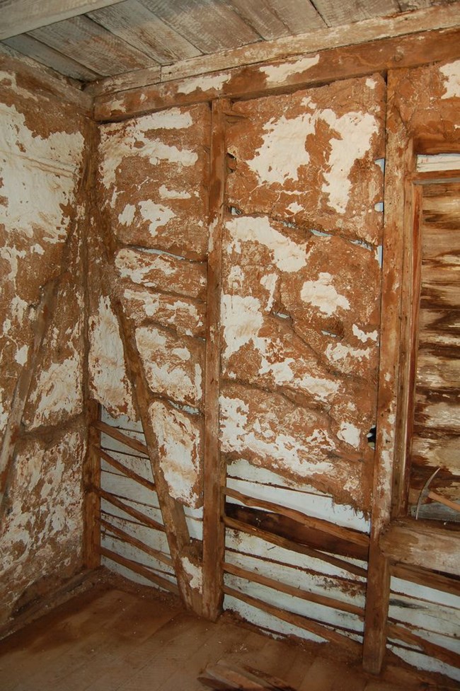 Section of wall to be repaired in the Cooks Cabin at Oakland Plantation.