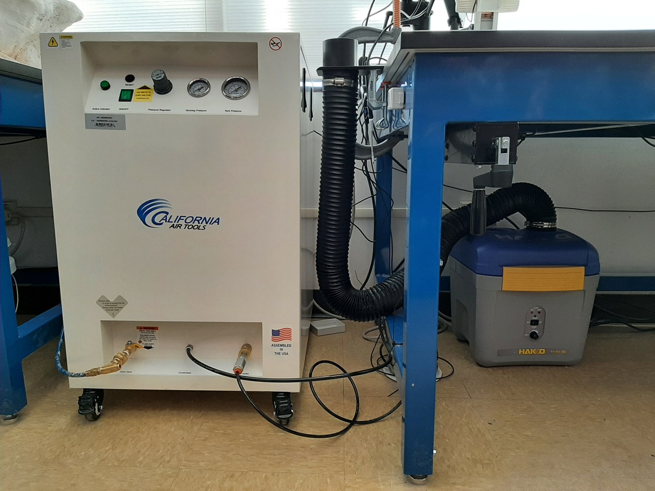 photo of an air compressor and dust collection system