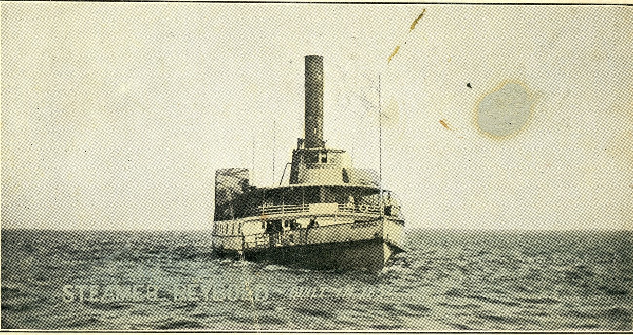 A steamboat in the water.