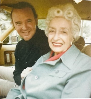 Toinette Bachelder, seated in her car with Raleigh DeGeer Amyx, circa 1985.