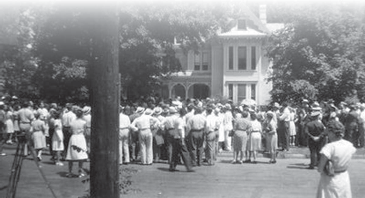Large crowd gathered at front of Truman Home in 1953.