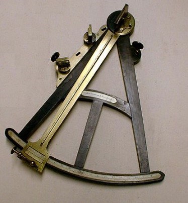 A triangular shaped quadrant made of ebony, brass and ivory.