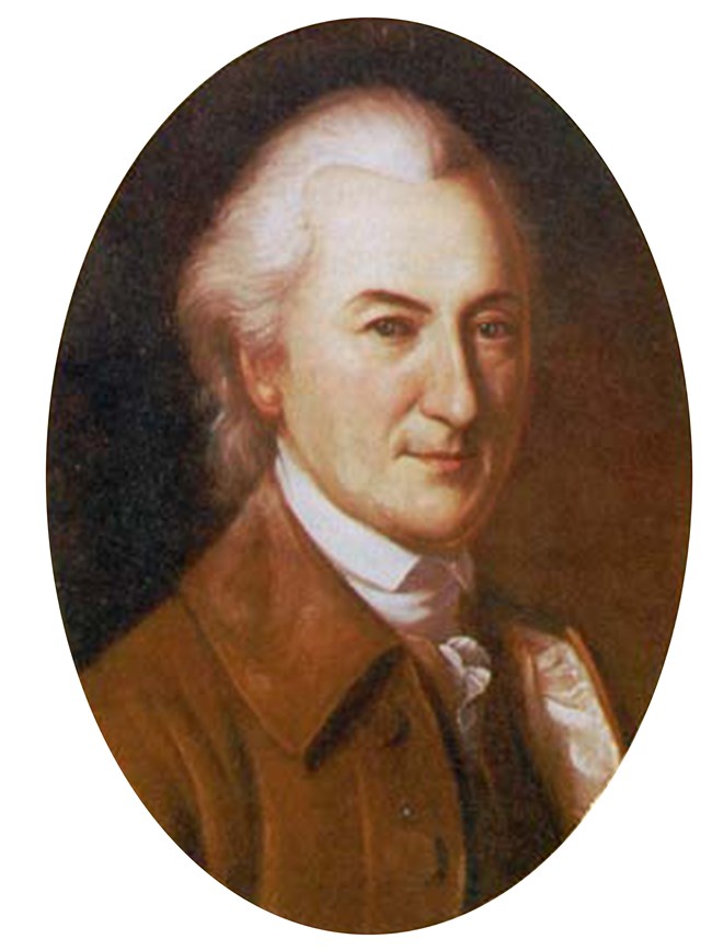 Oil on canvas portrait of a white male with grey hair wearing a brown coat.
