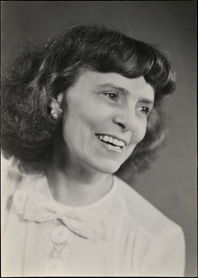 Black and white portrait of a smiling woman
