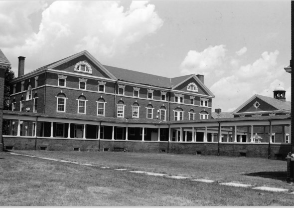 Black and white photograph of the Warfield Group Service Building, part of the Springfield State Hospital.