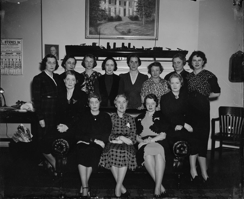 Toi Bachelder (second from left, back row) with the White House secretarial staff, in the White House Mail Room. February 19, 1938.