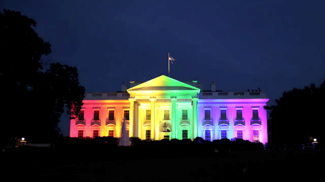 The White House is decorated in Rainbow lights.