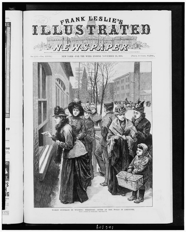 women in 19th century dresses casting their ballots in Wyoming.