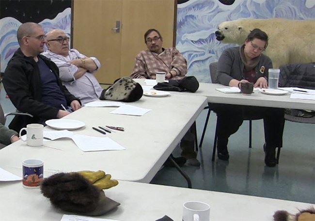 Indigenous people in Alaska in a meeting.