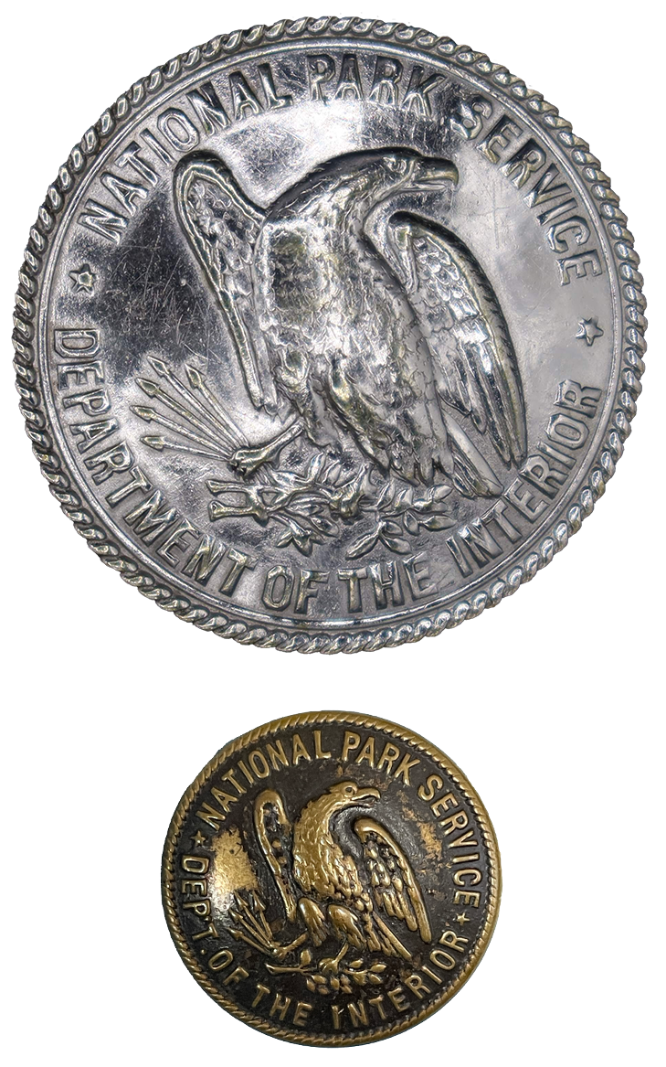 Round silver badge with eagle and smaller button with same eagle design
