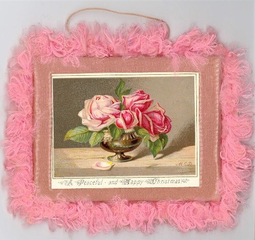 A pink-fringed Christmas Card