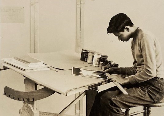 Man drawing a flower