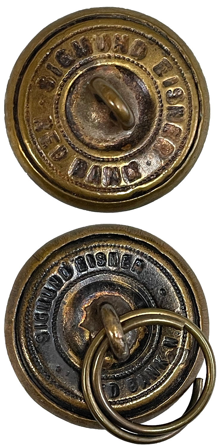 Backside of two brass buttons showing makers stamp