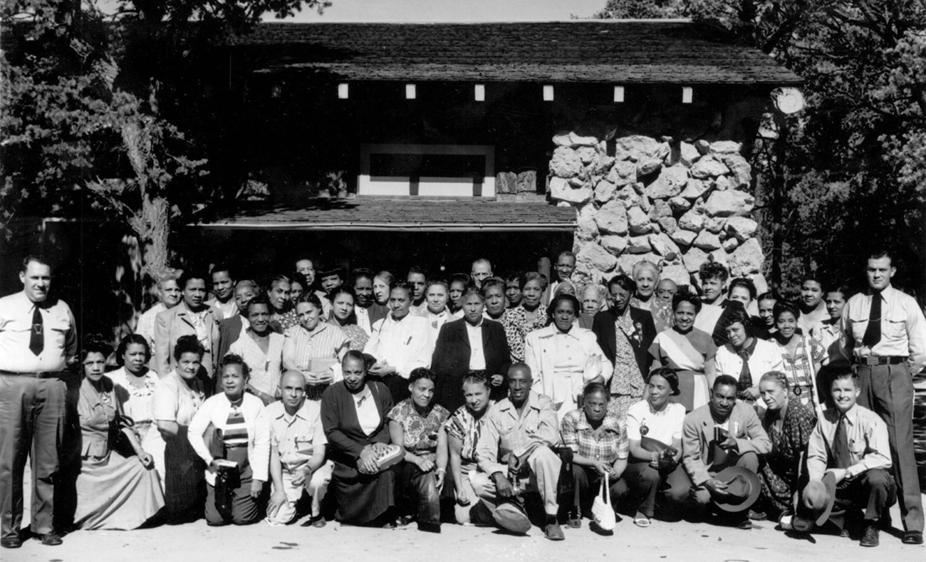 George H. Wallace President Washington Educational Touring Club and 50 members on the South Rim of Grand Canyon August 14, 15, 1948.