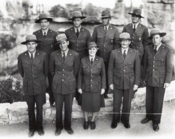 Lila Michaelsen Hansen at Carlsbad Caverns is standing in the front middle of the group.  She is the only one in a skirt.