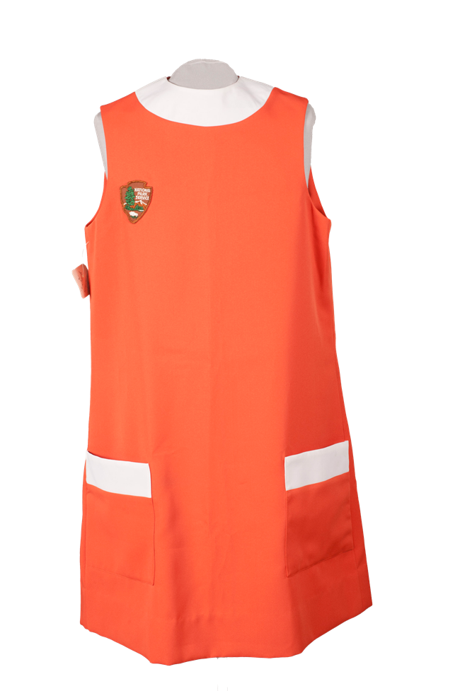 orange smock with white trim shown on a mannequin