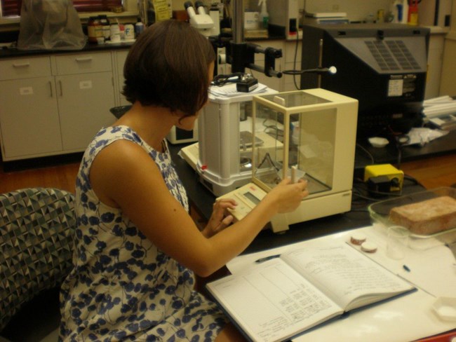 Kim Martin is weighing samples after they have been in the QUV.