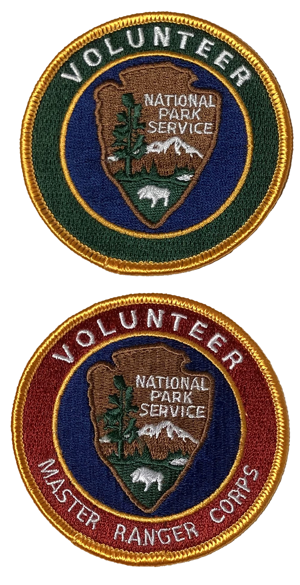 Two volunteer patches, one with blue border and one with red