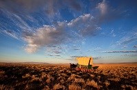 Cover wagon reenactment on the Oregon National Historic Trail. Credit: Bob Wick